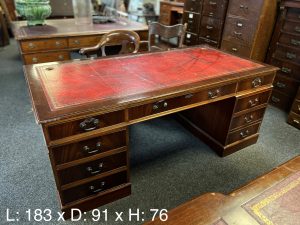 red leather dark wood desk