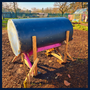A photograph of a recycled water drum used at Plattfields Market Garden 