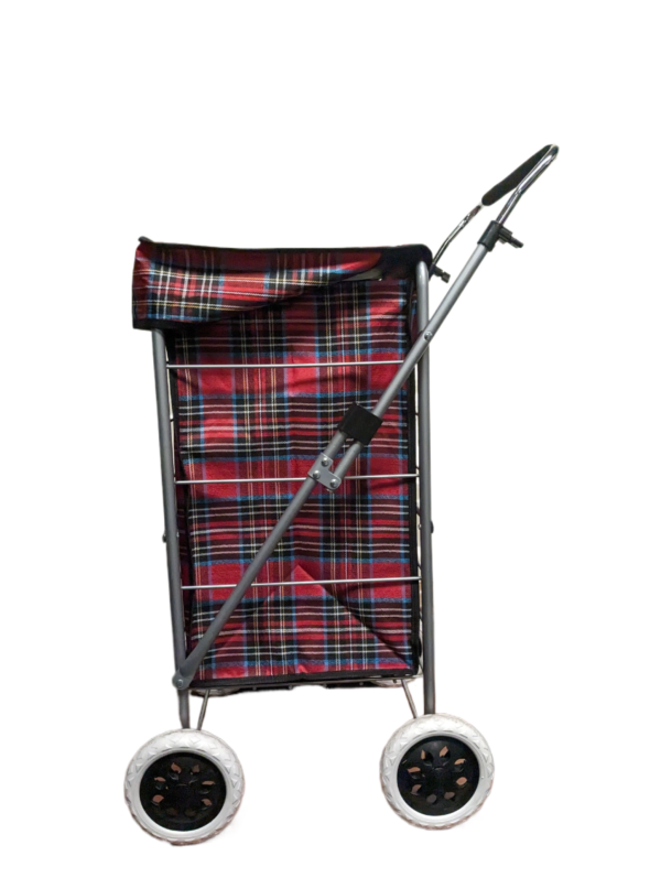 A red tartan shopping trolley with wheel. side view.